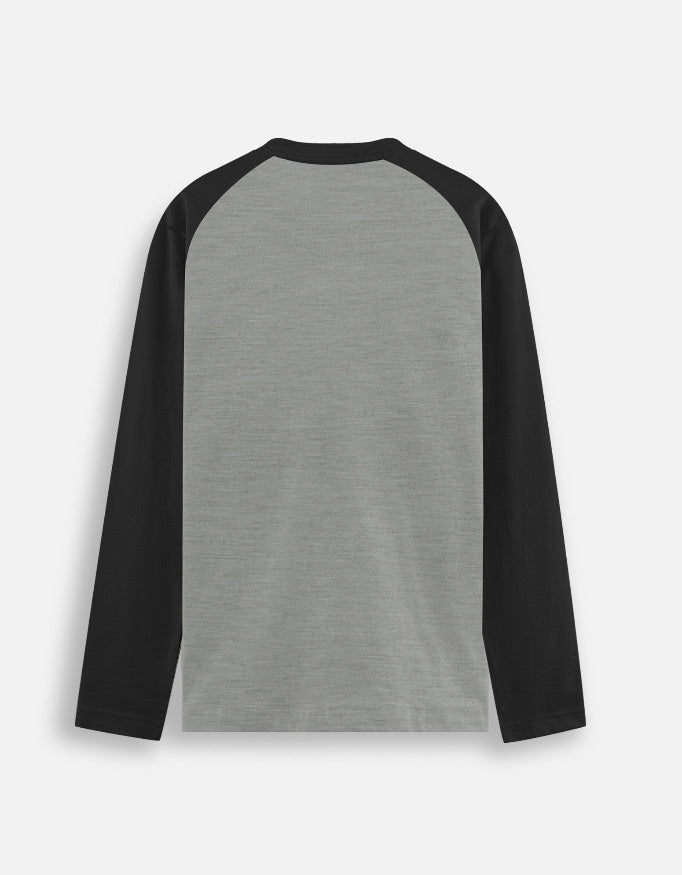 Back view of a long-sleeve raglan shirt with a grey body and black sleeves