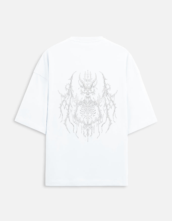 White oversized T-shirt with intricate light grey gothic skeleton and horned skull graphic on the back