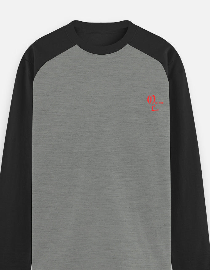 Grey and black raglan long sleeve shirt with small red left chest text design